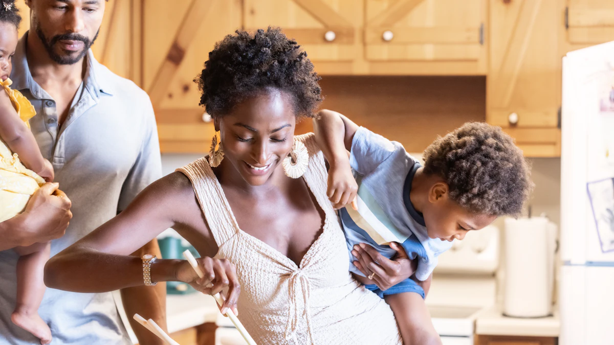 A family cooking together in a bright kitchen.